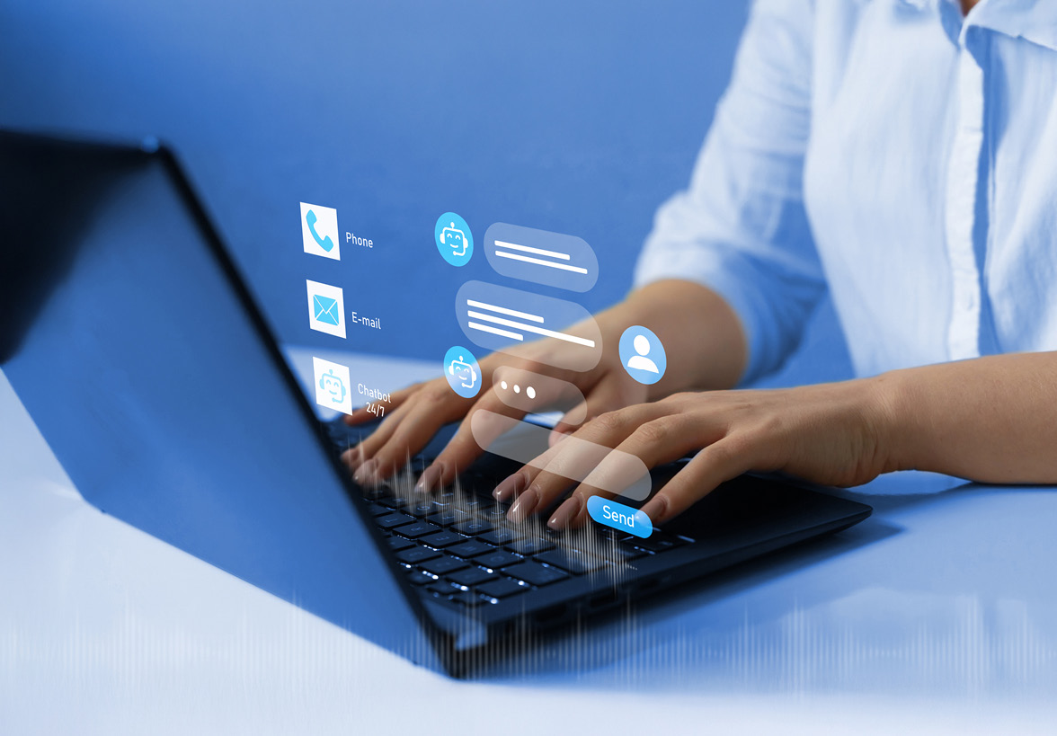 Workspace with woman wearing headset facing a man