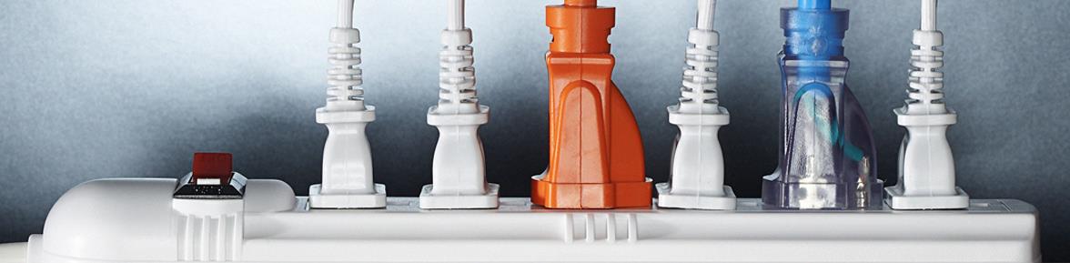 Two adults and two children smiling at the camera