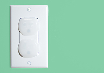 Electrical outlets with safety covers on them