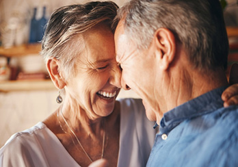a hand holding a lightbulb