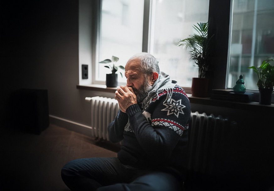 senior man staying warm
