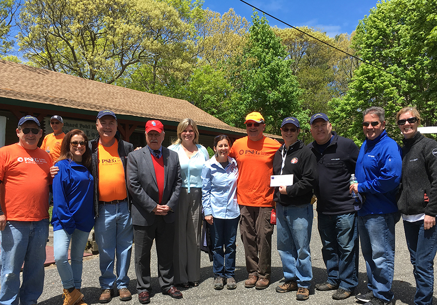 Group of PSEG LI personnel standing together outside