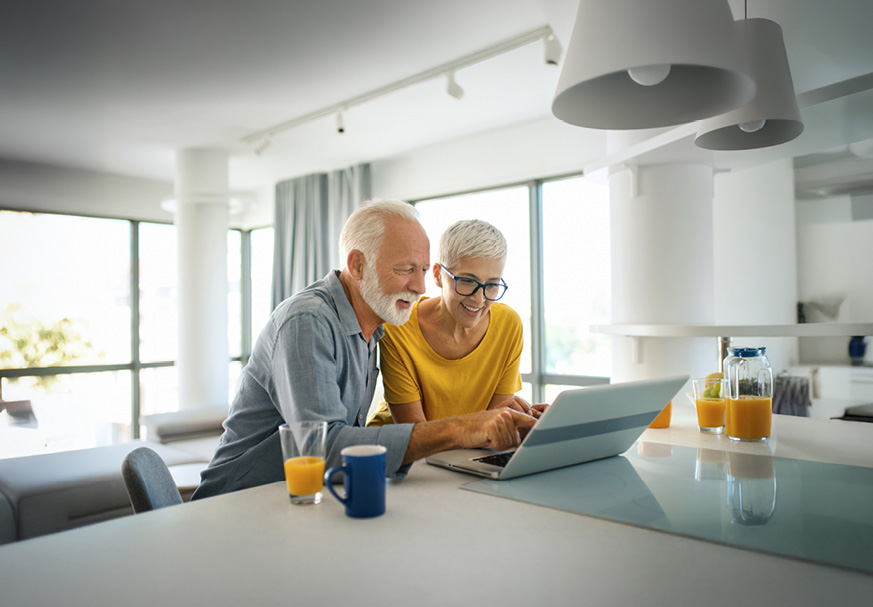 Hands holding blocks that spell out 