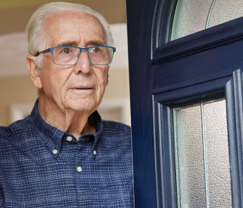 Man being scammed at home