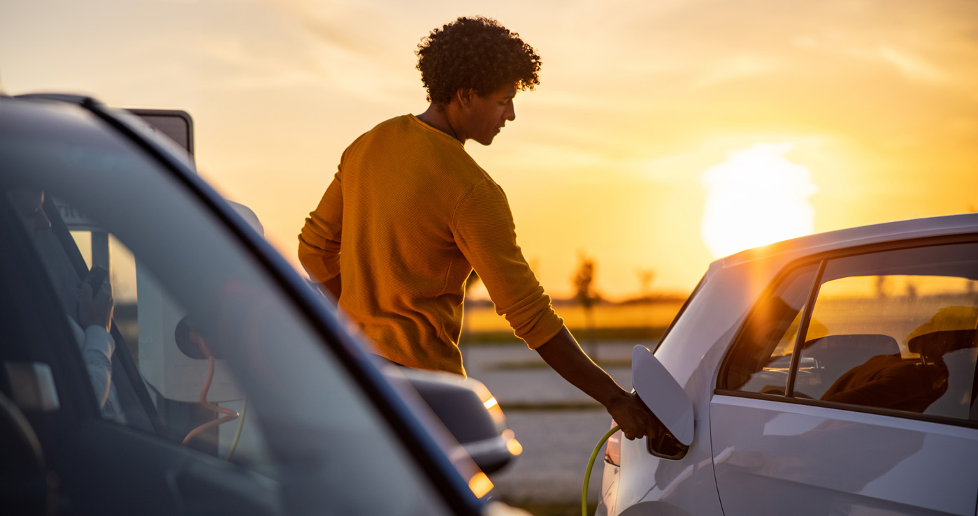 Man charging EV