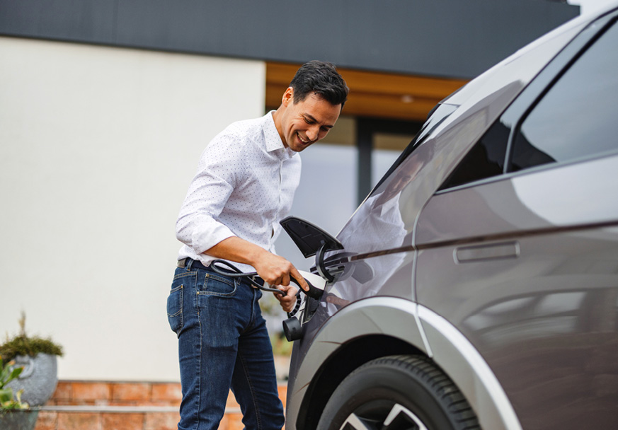 Man charging EV